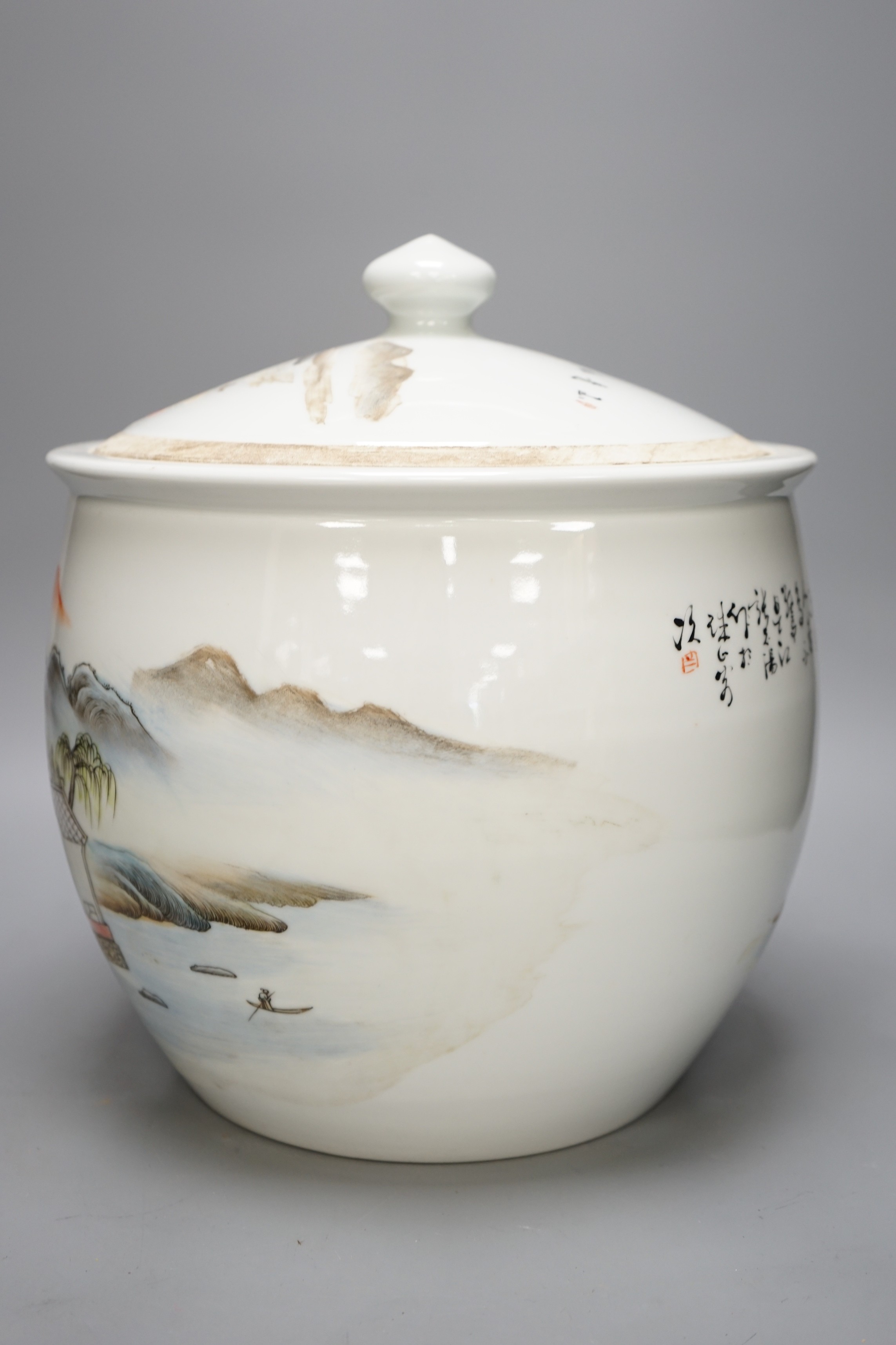 A large Chinese famille rose bowl and cover with mountainous landscape, 34cm tall